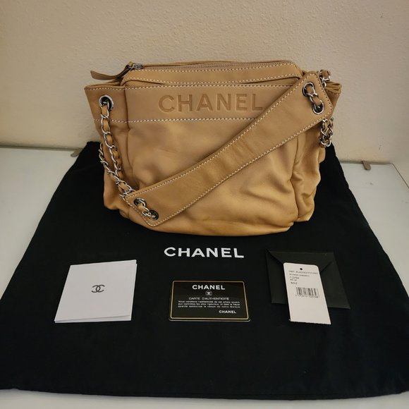 CHANEL Handbags - CHANEL Beige Lambskin Leather LAX Accordion Shoulder Bag
